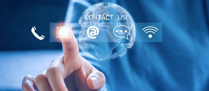 Person touching virtual contact icons, email, phone, chat, digital interface