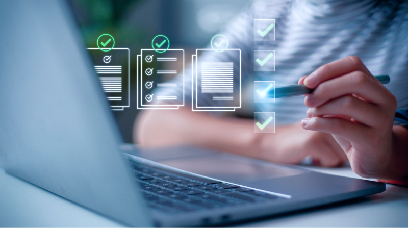 Digital compliance platform, checklists, person using laptop, futuristic overlay